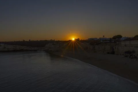 Sunset on the beach of Senhora da Rocha. Porches, Lagoa, Algarve Portugal. Stock Photos