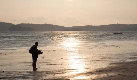 Sunset beach silhouette Stock Photos