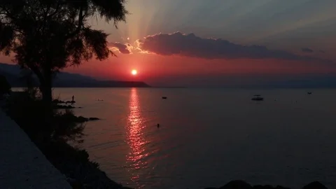 Sunset at the beach with silhouettes Stock Footage 78530275