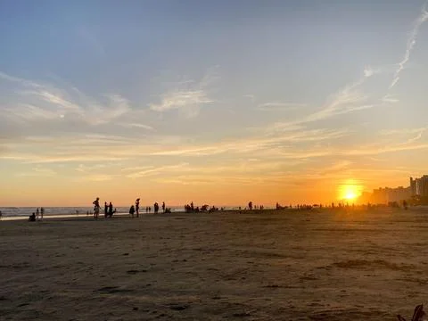 Sunset Beach Silhouettes Stock Photos