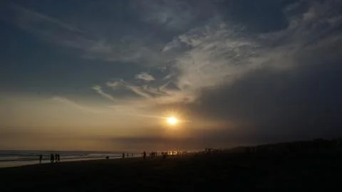 Sunset on the beach with a slightly reddish sky color 写真素材