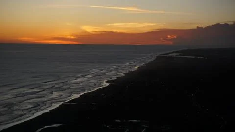 Sunset on the beach with a slightly reddish sky color Stock Photos