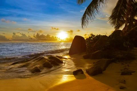 Sunset on beach source d'argent at seychelles Stock Photos