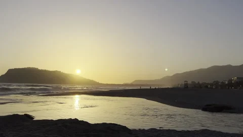 Sunset on the Beach Sun Reflection on Water Stock Footage 180694430