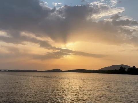 Sunset at the beach:, sun, sea water, clouds Stock Footage 248016253