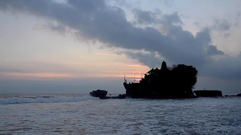 Sunset by the beach at a temple in Indonesia, za01 Stock Footage 106590293