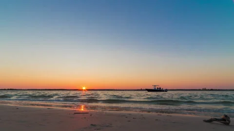 Sunset Beach Time Lapse with Boat Stock Footage 68027404