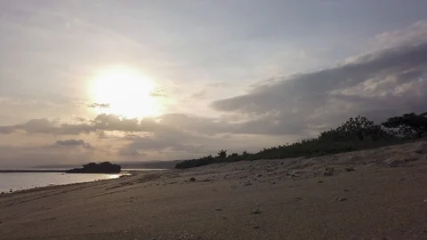 Sunset beach Timelapse with clouds moving and sun setting on empty beach Stock Footage 114631186