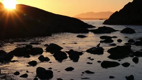 Sunset on a beach in Tofino BC Stockbeeldmateriaal 134538323