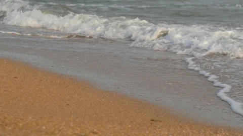 Sunset on the beach - Tranquil idyllic scene of a golden sunset over the sea Stock Footage 90055744