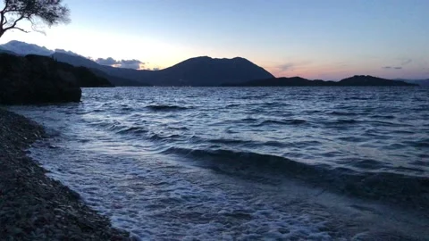 Sunset Beach Tropical Summer 4K Beautiful Water Sea Mountain Stock Footage 107984209