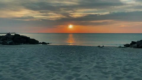 Sunset beach view, cinematic ocean horizon, peaceful sandy shore Stock Footage 311761387