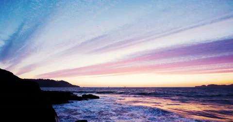 Sunset by the beach with waves clashing Video stock 69268197