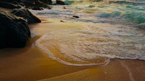Sunset at the Beach. Waves Crashing on the Sand. Stock Footage 53892892