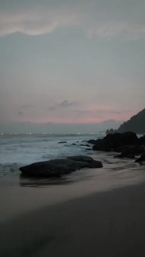 Sunset on the Beach with Waves Stock Footage 333497596