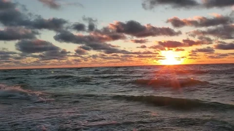 Sunset beach waves with sunset on the right 스톡 동영상 219422864