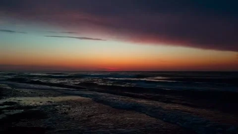 Sunset BeachCalm Ocean Waves at Sunset Stock Footage 307912243