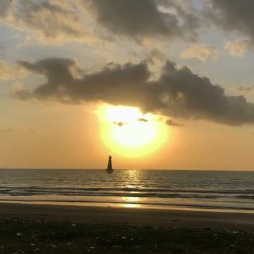 Sunset on a beautiful beach Stock Photos
