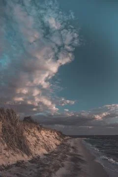 Sunset beautiful beach with sand dune landscape Stock Photos