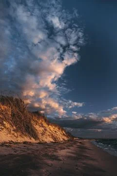 Sunset beautiful beach with sand dune landscape Stock Photos