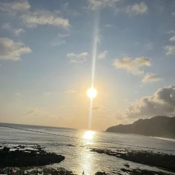 Sunset on the beautiful coast Stock Photos