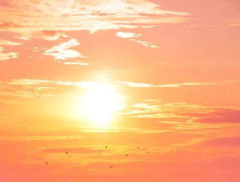 Sunset. Beautiful landscape with clouds and orange sun in the sky Stock Photos
