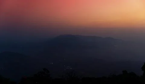 SUNSET ON THE BEAUTIFUL MOUNTAIN RANGES Stock Photos