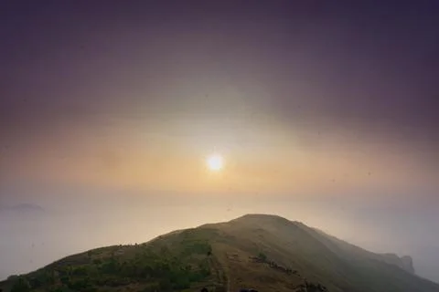 SUNSET ON THE BEAUTIFUL MOUNTAIN RANGES Stock Photos