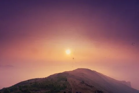 SUNSET ON THE BEAUTIFUL MOUNTAIN RANGES Stock Photos