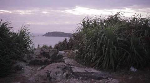 Sunset on the beautiful rocky beach, panorama. Very picturesque landscape. Stock Footage 44265581