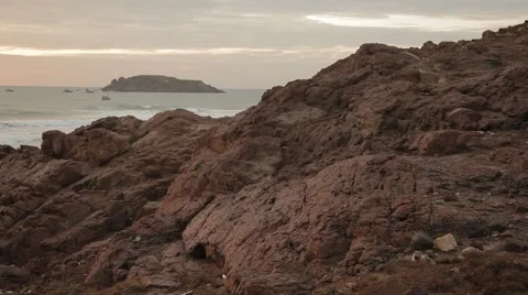 Sunset on the beautiful rocky beach. Very picturesque landscape. Stock Footage 44265419