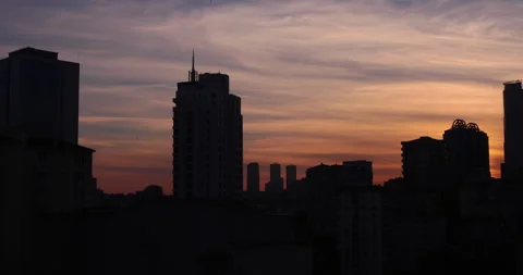 Sunset from behind building. 2K Stock Footage 132568118