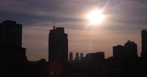 Sunset from behind building. 2K Stock Footage 132568758