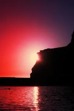 Sunset behind the cliff Fotos de archivo