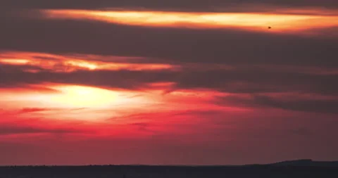 Sunset Behind Clouds Close Up Timelapse Stock Footage 141142548