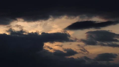 Sunset Behind the Clouds: A Dramatic Time-lapse Stock Footage 239474664