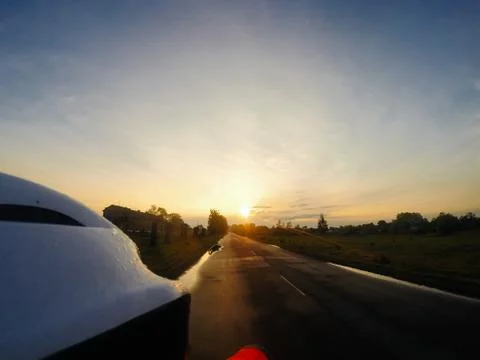 Sunset behind the cyclist, Foto stock