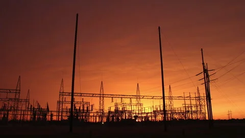 Sunset behind an electric power relay station, 4K. Stock Footage 241542266