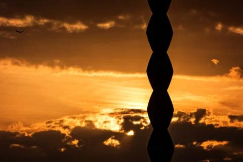 Sunset behind the Endless Column by Brancusi Stock Photos