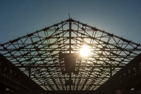 Sunset behind framework of abandoned factory Stock Photos