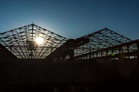 Sunset behind framework of abandoned factory Stock Photos