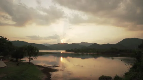 Sunset behind him in the middle of the forest swamp Stock Footage 186924152