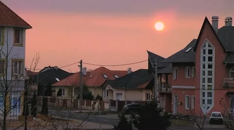 Sunset behind the house Stock Footage 10803318