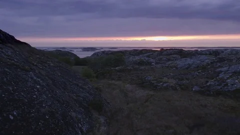 Sunset behind islets Stock Footage 79474655