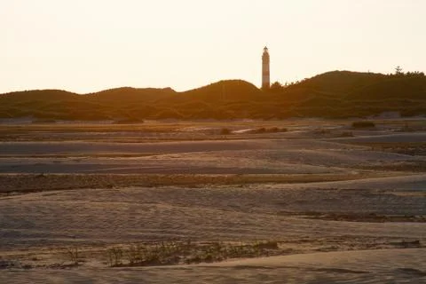 Sunset behind lighthouse Stock Photos
