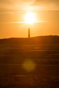 Sunset behind lighthouse Stock Photos