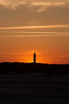 Sunset behind lighthouse Stock Photos
