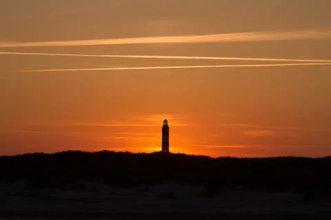 Sunset behind lighthouse Stock Photos