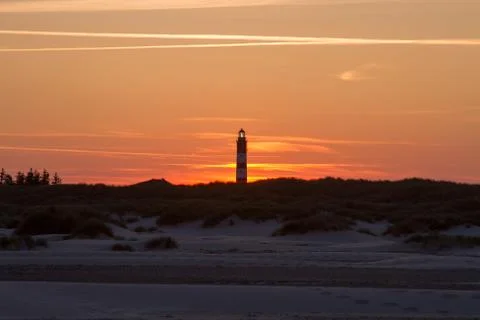 Sunset behind lighthouse Stock Photos