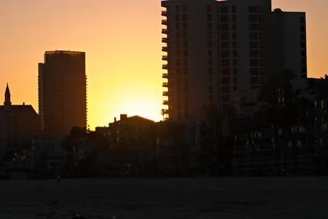 Sunset Behind the Long Beach skyline Stock Photos
